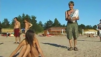 A Young And Stunning Girl Enjoys A Nude Play At The Seaside
