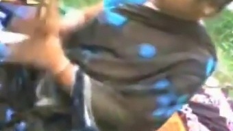 Desi Aunty And Young Boy Indulging In Sexual Play