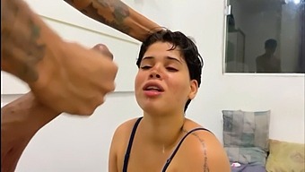 A Caucasian Woman Performs Oral Sex On A Man'S Penis